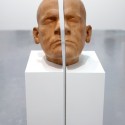 The Kiss, 2011 --- Wooden mask of Father's head with void of my own head smiling inside 32 x 32 x 150cm Object; Steamed pear wood, split plinth