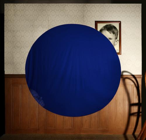 Into the Black (hole cut in wall, with blue-screen backdrop hung behind), 2011