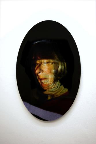 False Assumption 2 (my mum's face from old family photo projected back onto her face), 2012