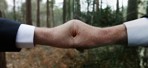 Untitled (Father's clenched fist with flipped photograph of his clenched fist), 50 x 23cm, Photograph 2016